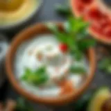A bowl of strained yogurt with fresh herbs and spices