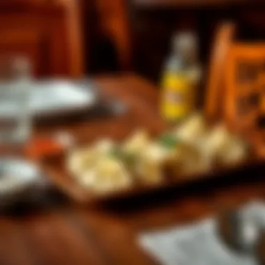 Dining Experience Featuring Uzbek Dumplings A wooden table set with Uzbek dumplings and dipping sauce